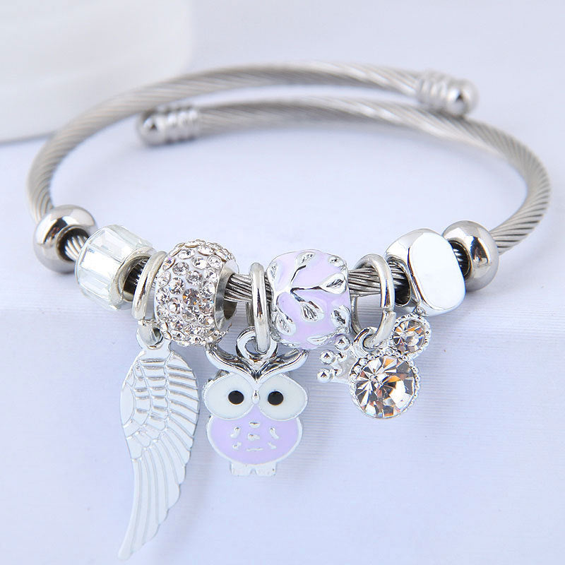 💫 GuardianGlow™ Beaded Bracelet – Owl & Wings Pendant on Steel Chain - One For All
