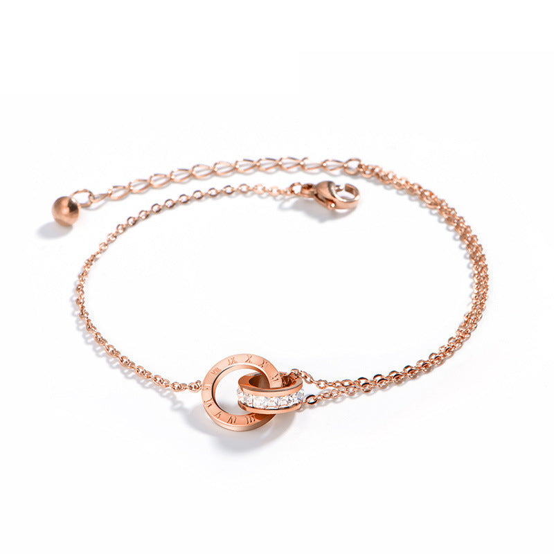 "EternaRoma™ Rose Gold Titanium Bracelet – Roman Numerals & Zircon Elegance" - One For All