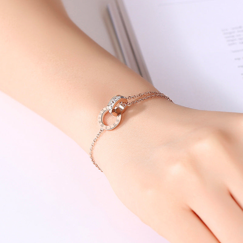"EternaRoma™ Rose Gold Titanium Bracelet – Roman Numerals & Zircon Elegance" - One For All