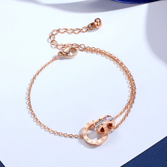 "EternaRoma™ Rose Gold Titanium Bracelet – Roman Numerals & Zircon Elegance" - One For All
