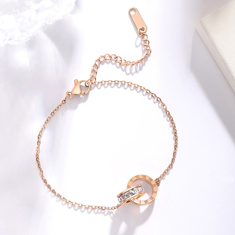 "EternaRoma™ Rose Gold Titanium Bracelet – Roman Numerals & Zircon Elegance" - One For All